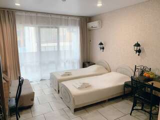 Гостиница Нараяна Лоо Улучшенный двухместный номер с 2 отдельными кроватями-3